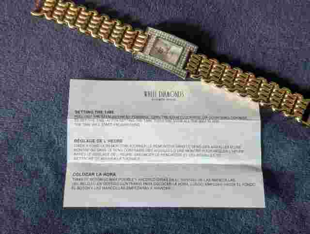 Vintage Elizabeth Taylor Womens White Diamonds Gold Tone Quartz Watch