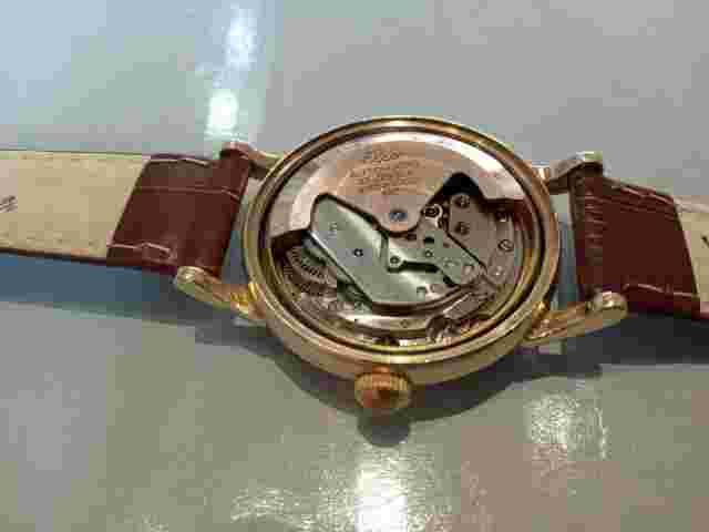 Gent's Elco 9 carat gold mechanical automatic watch on leather strap.