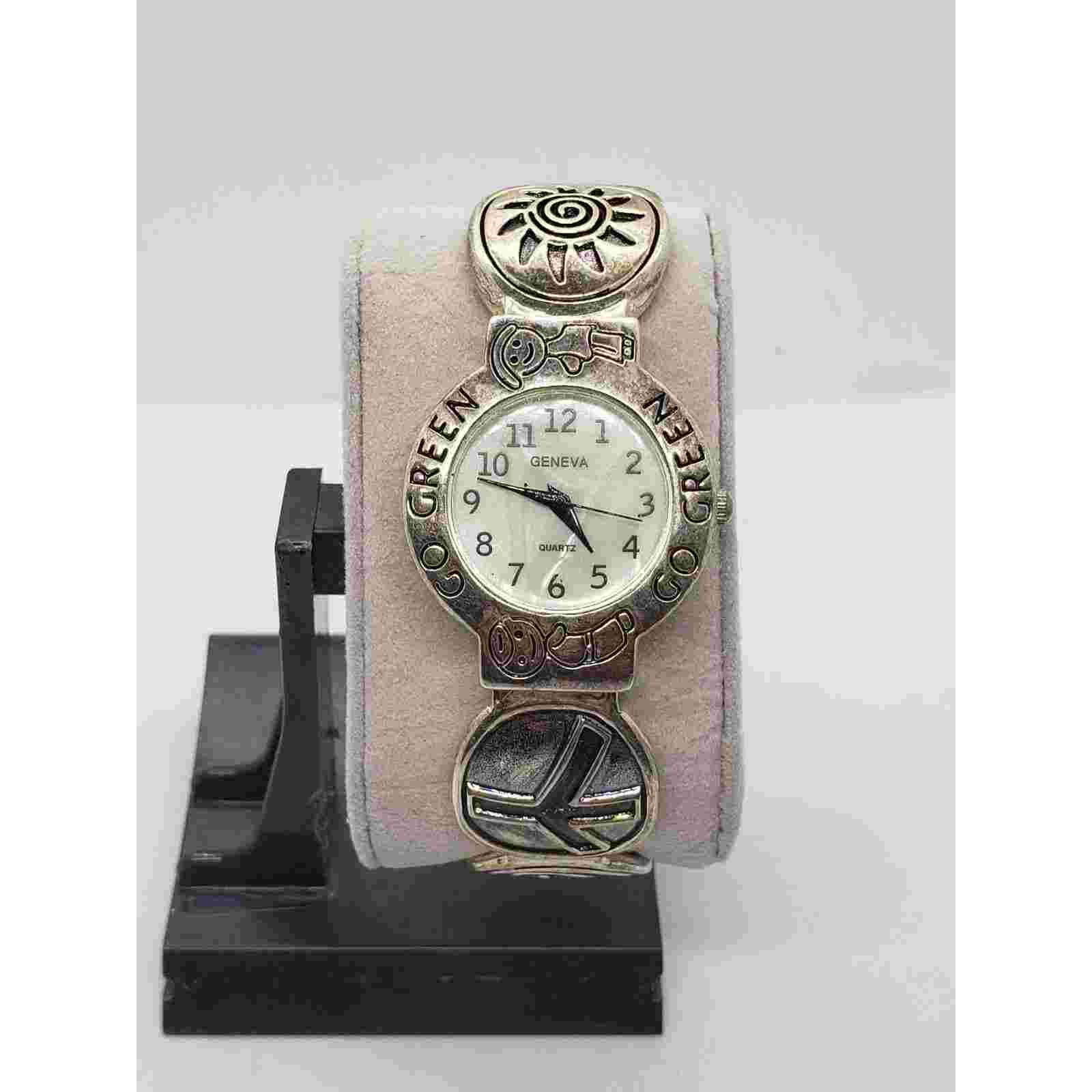 Geneva SW-194 women's novelty watch. Small children on bevel, Metal bangle band