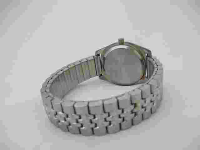 Epoch Unisex Silver Toned Stretch Band Watch Analog