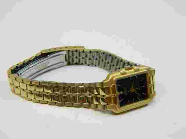 Elegant Bill Blass Gold Tone Lady's watch/wristwatch