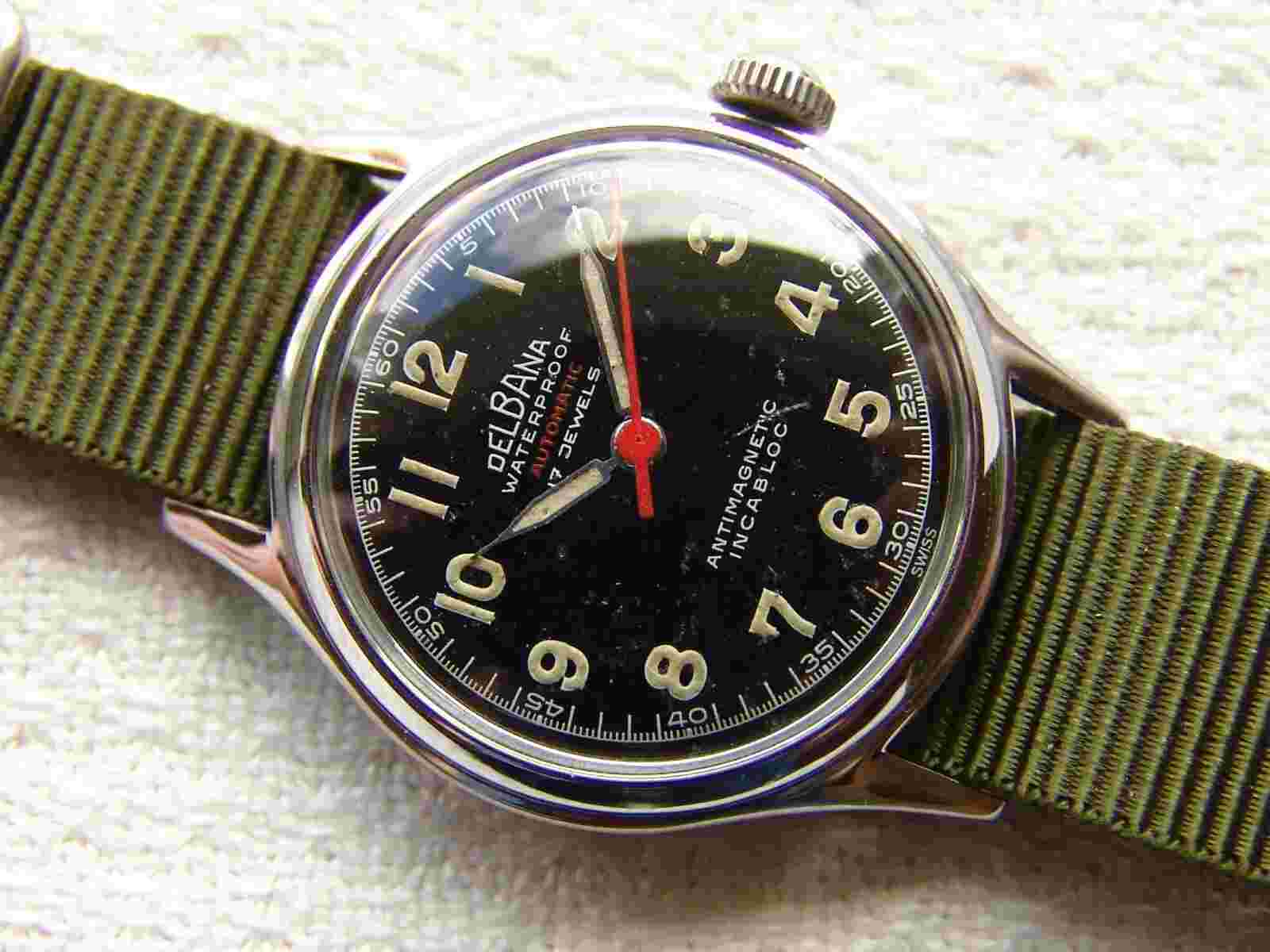 WWII PERIOD men's DELBANA automatic military style WRISTWATCH good condition