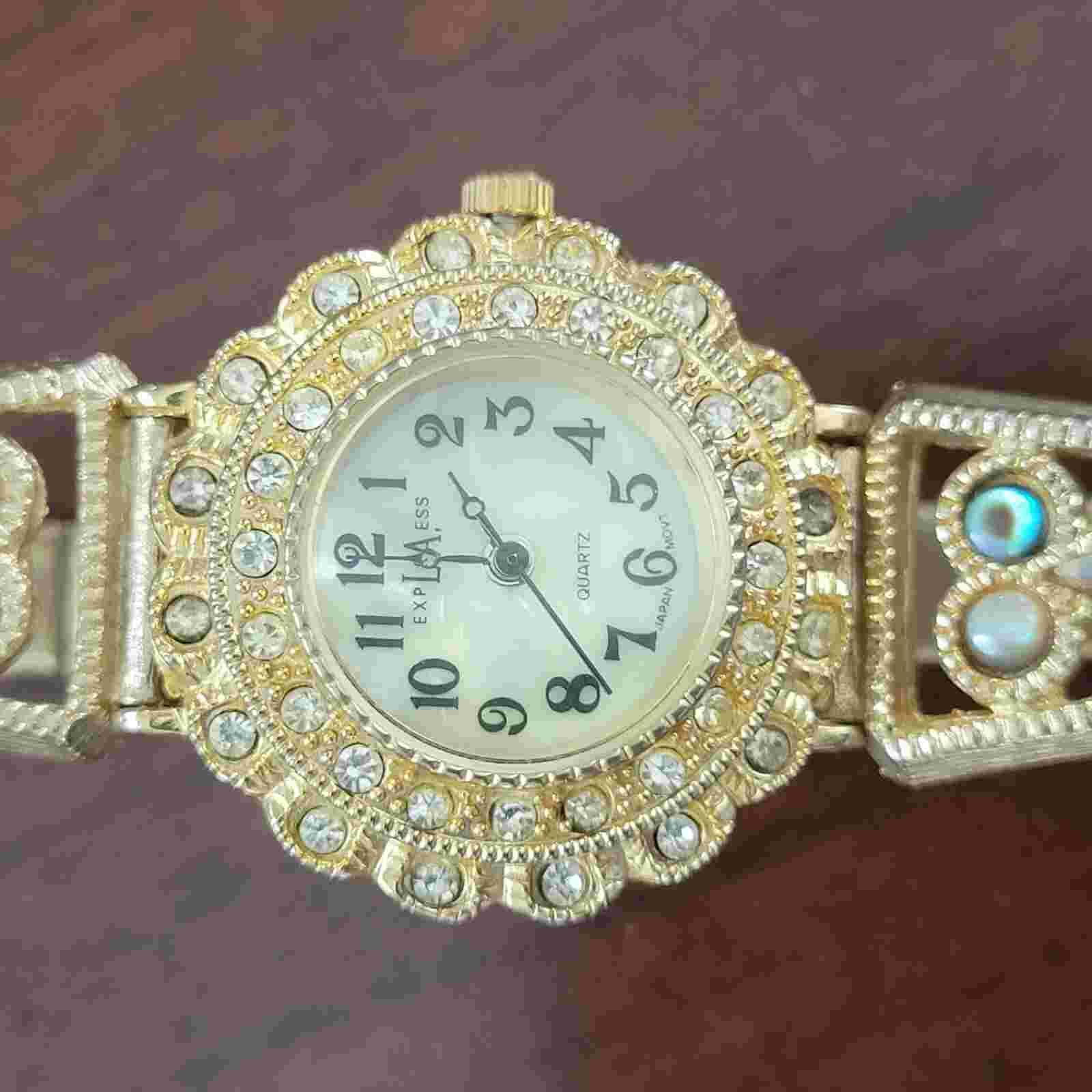 Exquisite Express LA Quartz Womens Watch With Rhinestone Pearl Accents Gold Tone