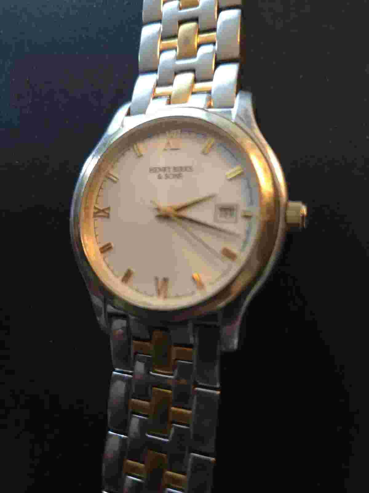 HENRY BIRKS & SONS Men's quartz dess watch Roman Numerals Gold And Silver Tone.