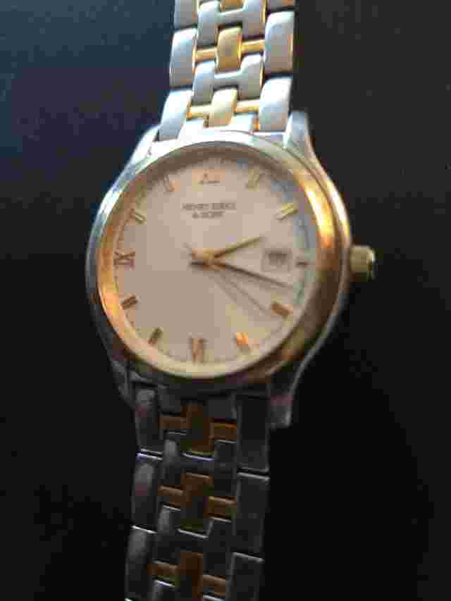HENRY BIRKS & SONS Men's quartz dess watch Roman Numerals Gold And Silver Tone.
