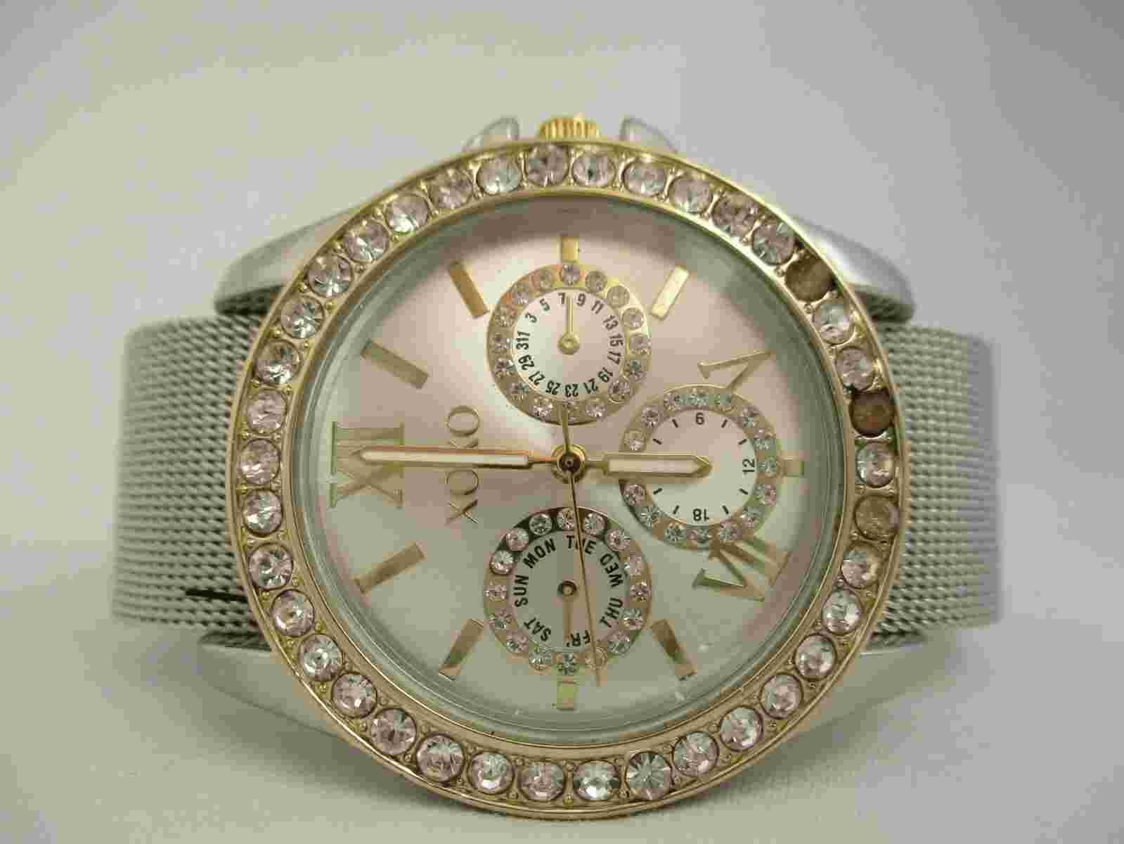 XOXO Women's Silver Toned Bracelet Band Analog Watch