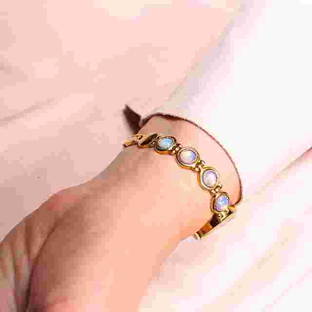 Small elegant vintage women's watch LUCH. Cgilded filigree and moonstone inserts