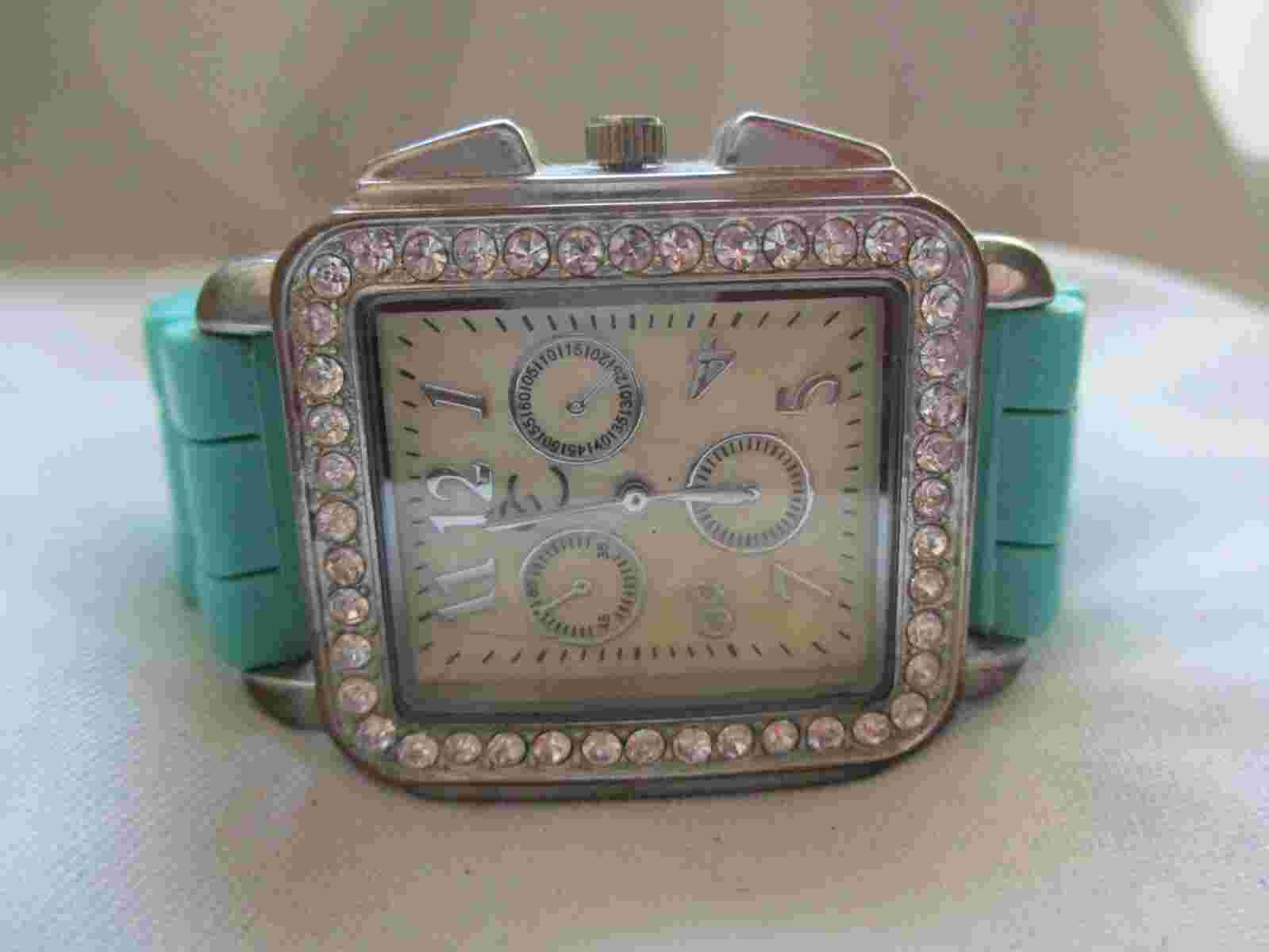 Charming Charlie Analog Wristwatch with a Buckle Band and Water Resistance