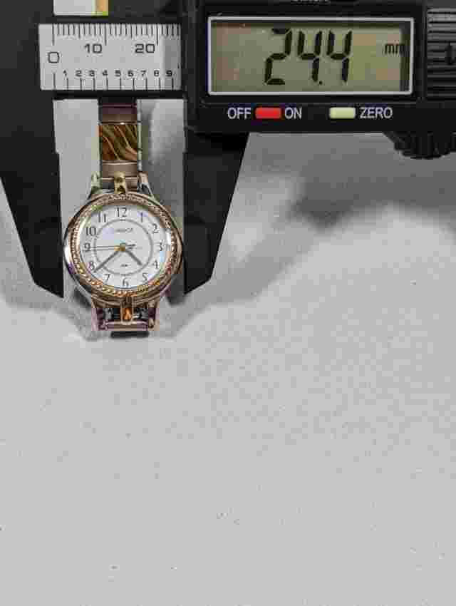 Carriage Womans White Dial Round Case Two Tone Stainless Stretch Band Watch