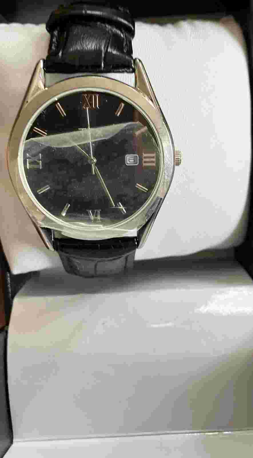 TFX Bulova White Dial Date Indicator Round Silver Tone Black Leather Band Watch