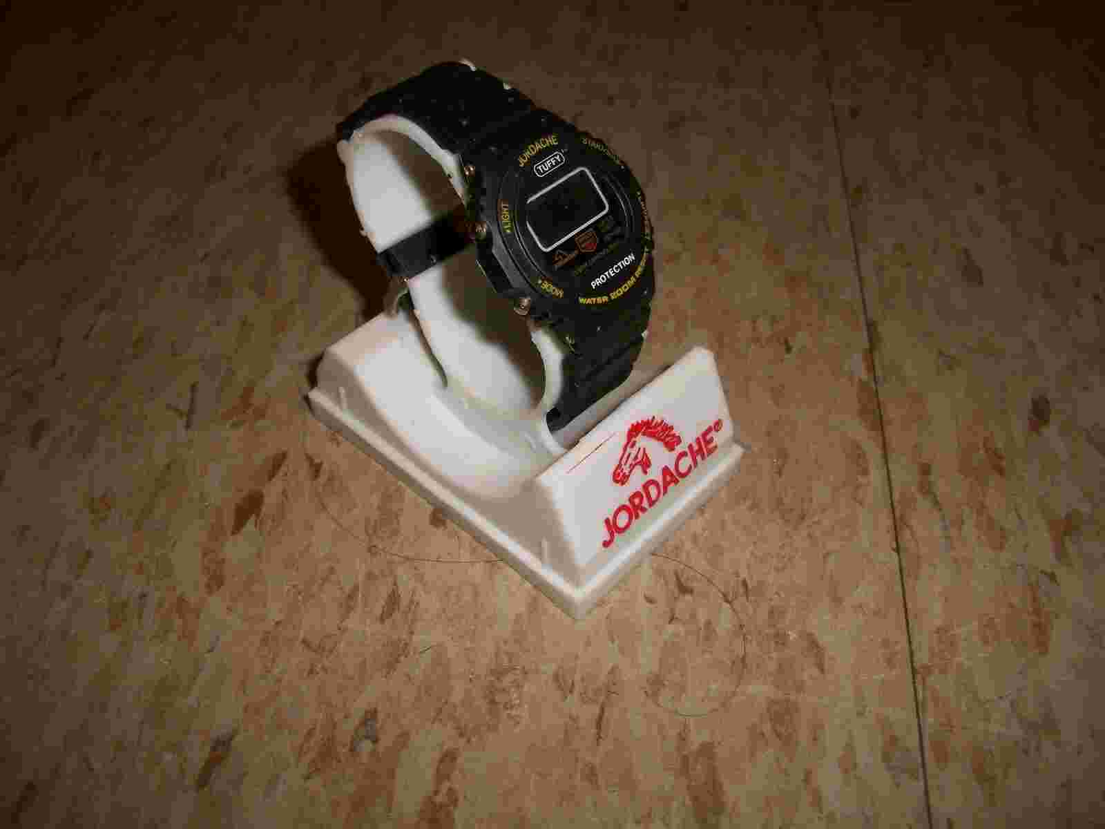 Vintage 1980’s Jordache Wrist Watch w original display stand for parts
