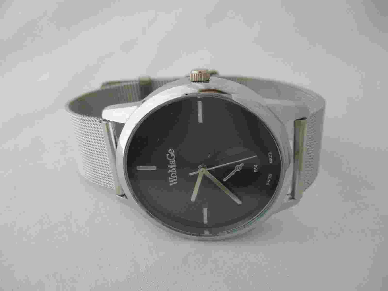 Womage Women's Silver Toned Bracelet Band Analog Watch Swiss Made