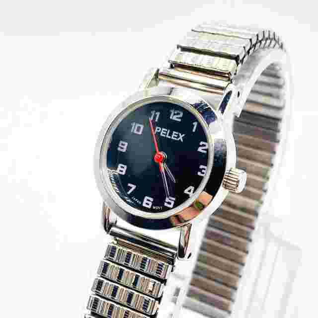 Vintage PELEX Silver Tone Wrist Watch Quartz Stainless Steel Back Stretch Strap