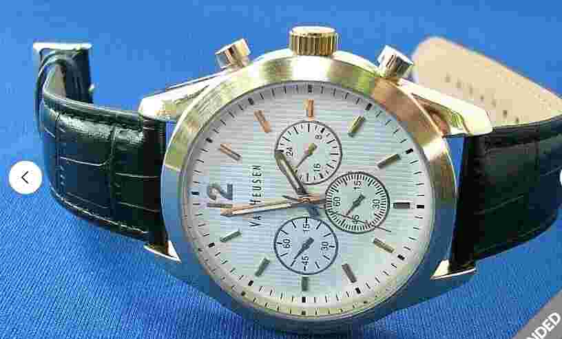 Van Heusen watch with battery powered quartz movement