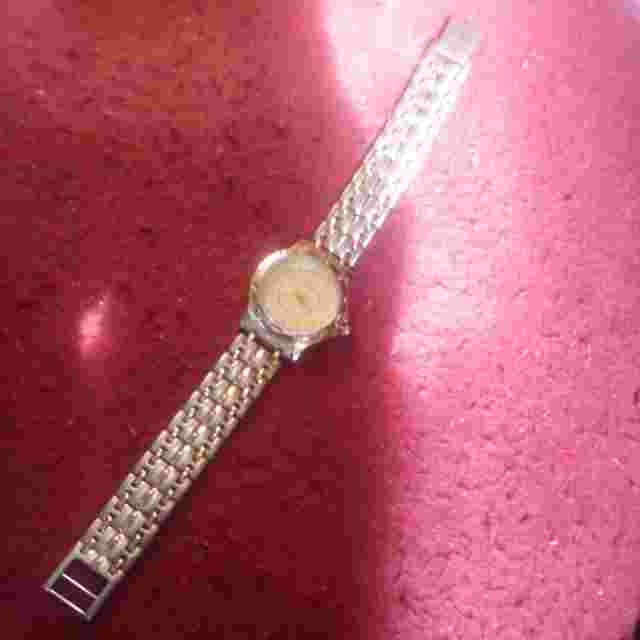 Jostens AT&T Ladies Swiss watch.Gold plated.27mm case.7.7"band.Nice.Rect.Battery