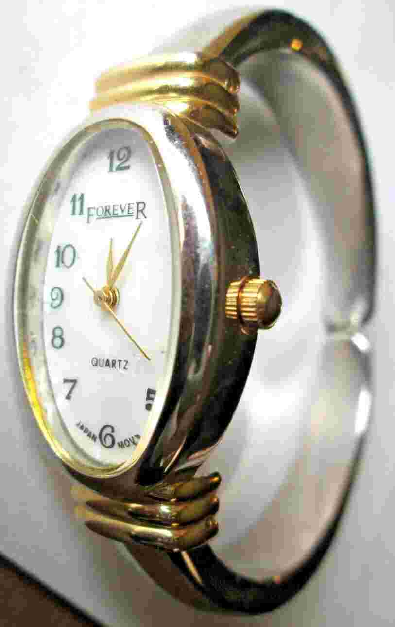 VINTAGE LADIES' FOREVER QUARTZ , WORKING, NEW BATTERY, SPRING ACTION BAND, USED