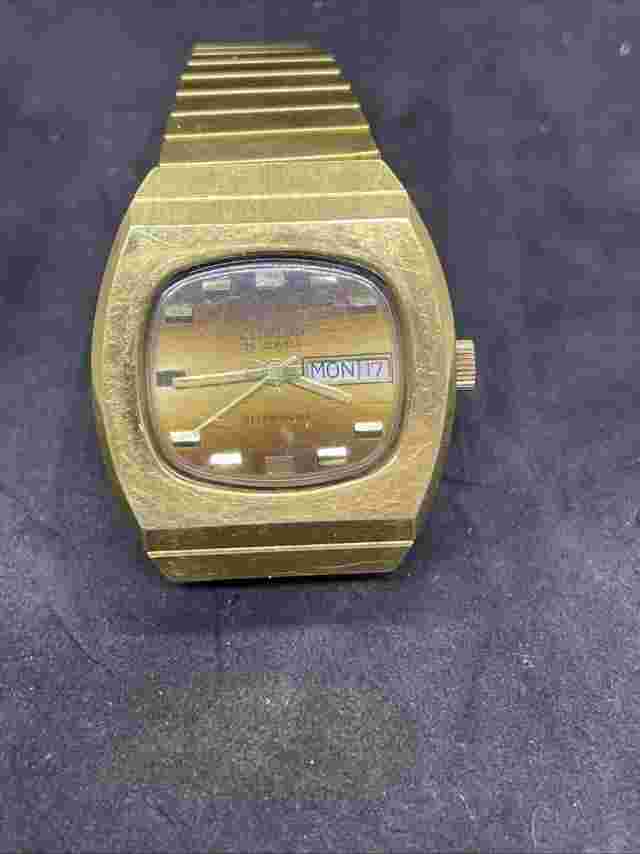 Vintage CLINTON men's automatic watch Ronda 1239 25Jewels Gold dial swiss 1970s