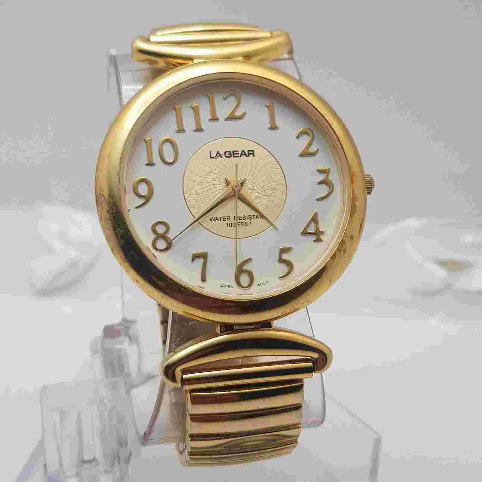 LA Gear Quartz Analog Watch White Dial Stainless Steel Gold Band....NEW BATTERY
