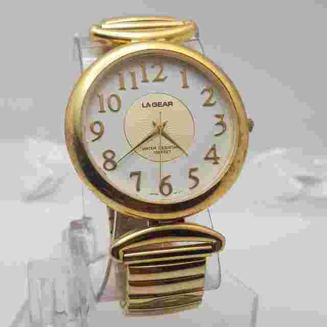 LA Gear Quartz Analog Watch White Dial Stainless Steel Gold Band....NEW BATTERY