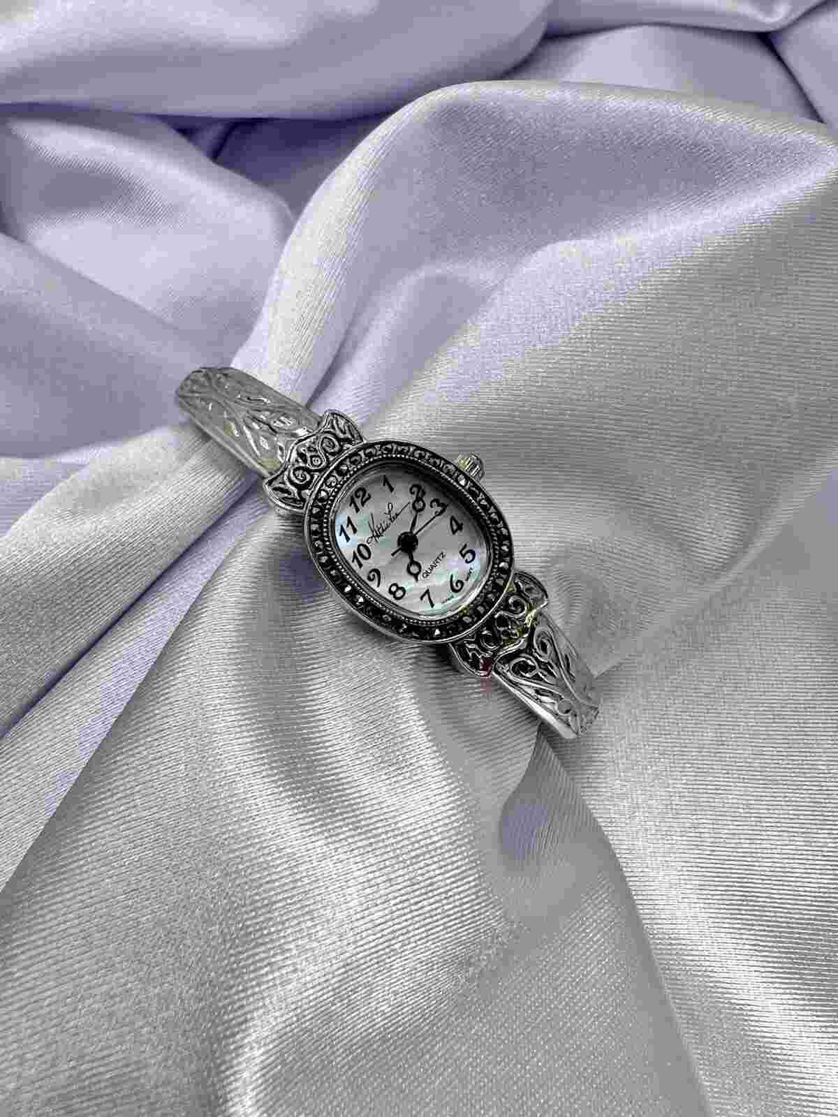 Kathie Lee Silver Cuff Bangle Womens Oval Watch Mother Of Pearl Dial Petite Goth