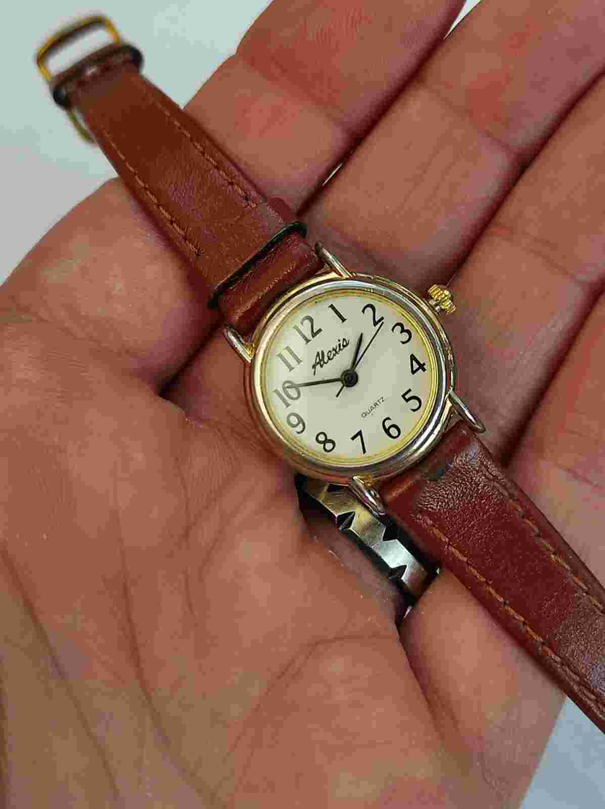 Alexis women's quartz gold tone leather strap wristwatch