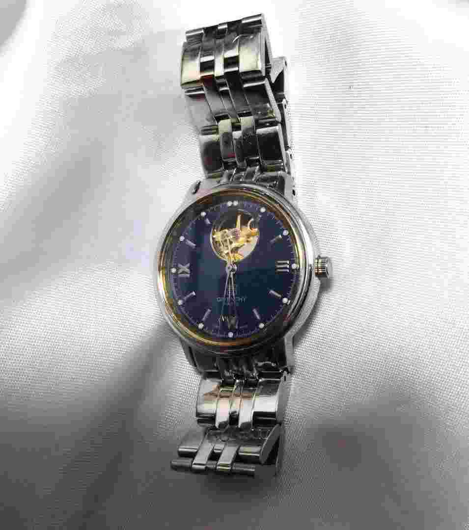Genuine GIVENCHY open heart watch