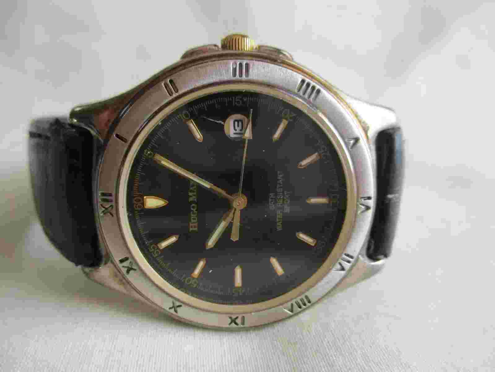 Hugo Max Analog Wristwatch with a Buckle Band and Water Resistance