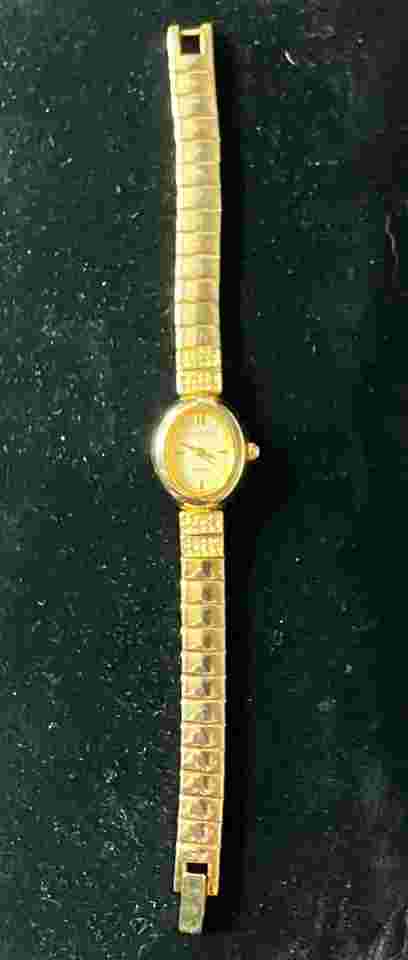Women’s Adolfo Goldtone Watch With Crystals On The Band New Battery