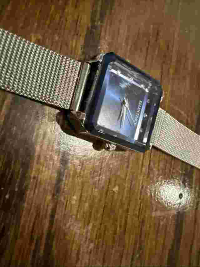 Ellen Tracy Women's Silver Tone Faceted Bezel Watch