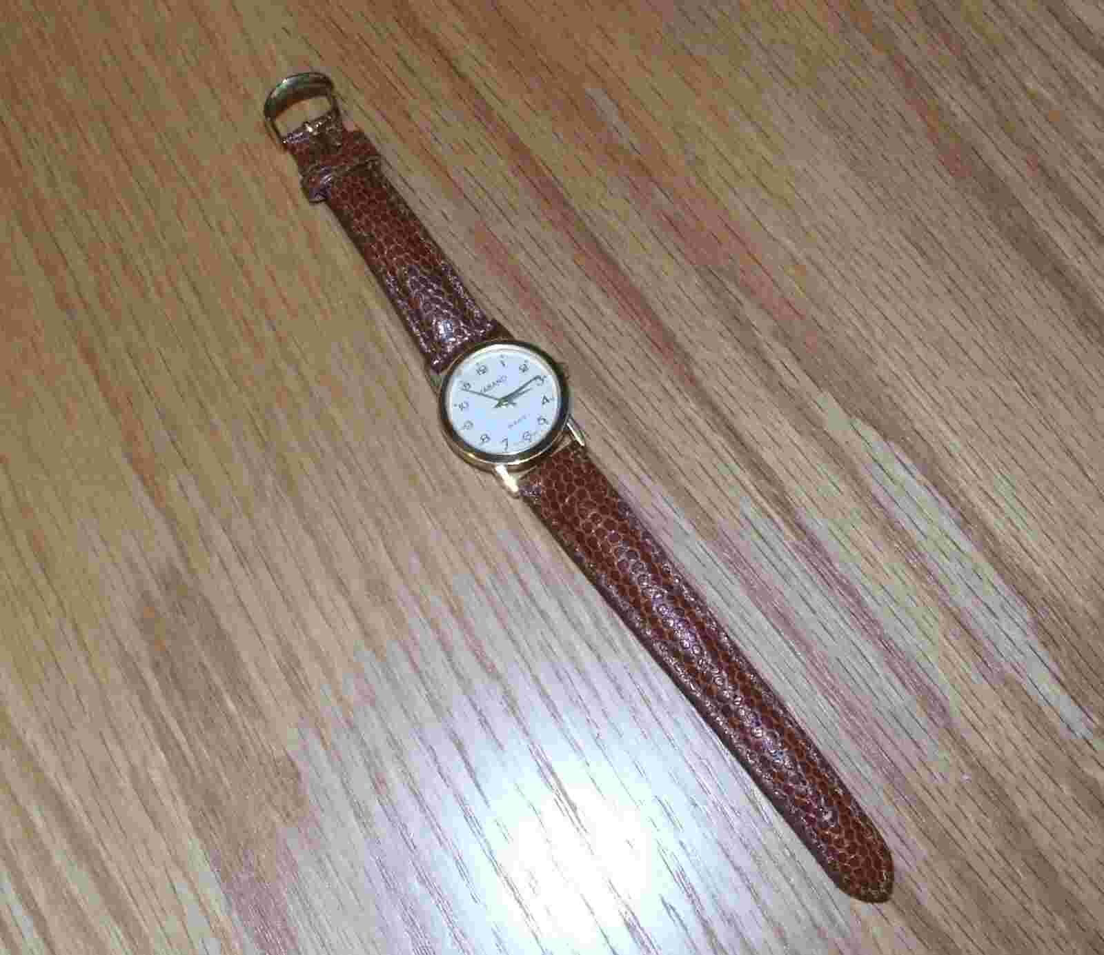 HABAND QUARTZ GOLD-TONE TIME PIECE WITH BROWN SNAKE DESIGN