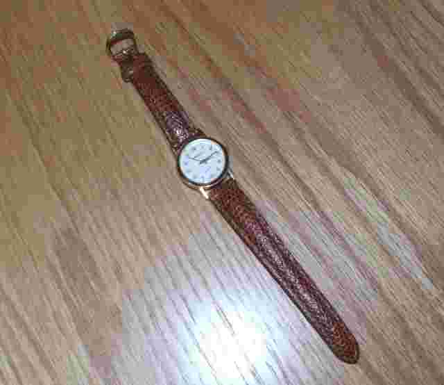 HABAND QUARTZ GOLD-TONE TIME PIECE WITH BROWN SNAKE DESIGN