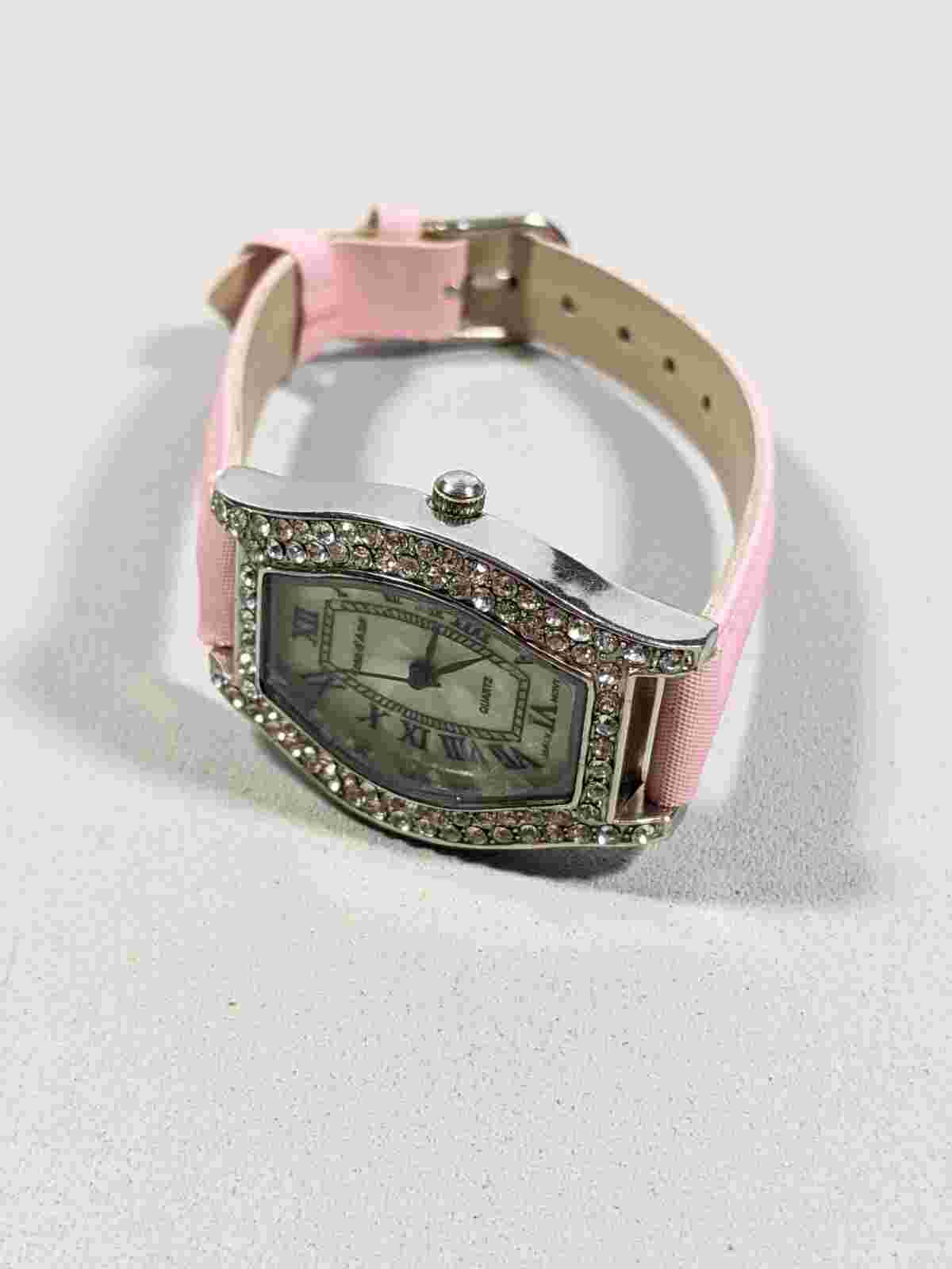 Cote d' Azur Pearlized Dial Crystal Accent Silver Tone Case Pink Band Watch