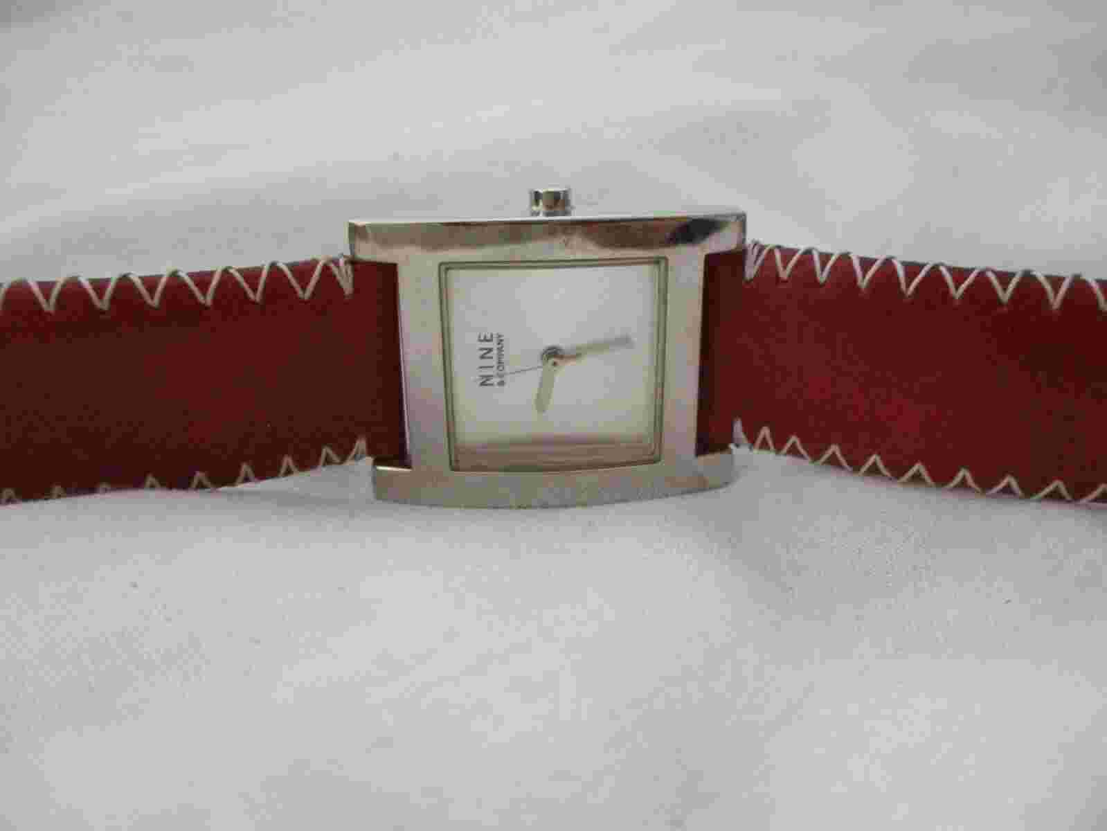 Nine & Company Analog Wristwatch with a Buckle Band