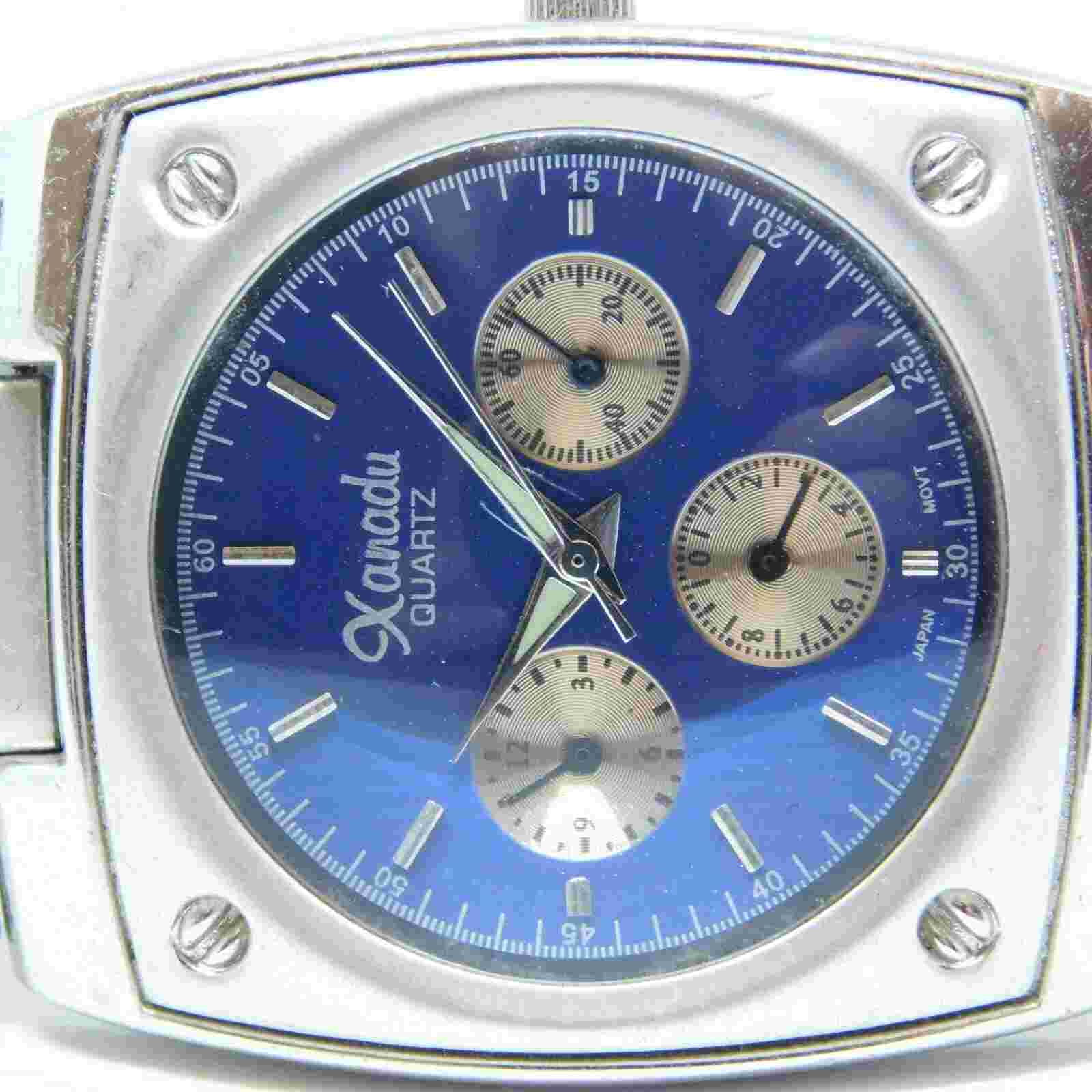 Xanadu 7649 Silver Tone Blue Dial Quartz Analog Men's Watch Sz. 8 1/4"