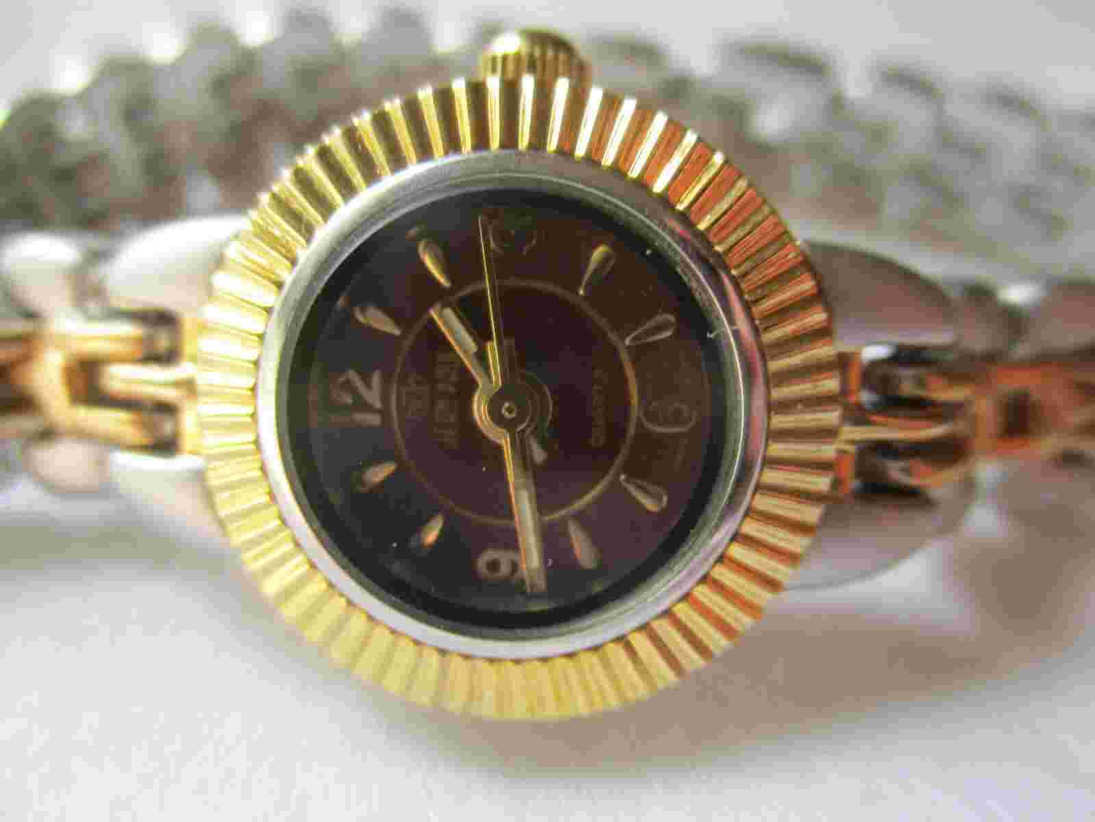 Jean Paul Wristwatch Gold and Silver Two Tone Band Round Red Face Elegant