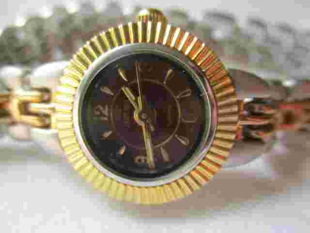 Jean Paul Wristwatch Gold and Silver Two Tone Band Round Red Face Elegant
