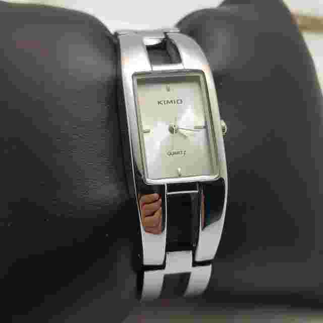 Kimio Quartz Women's Watch Silver Dial Stainless Steel Silver Band...NEW BATTERY