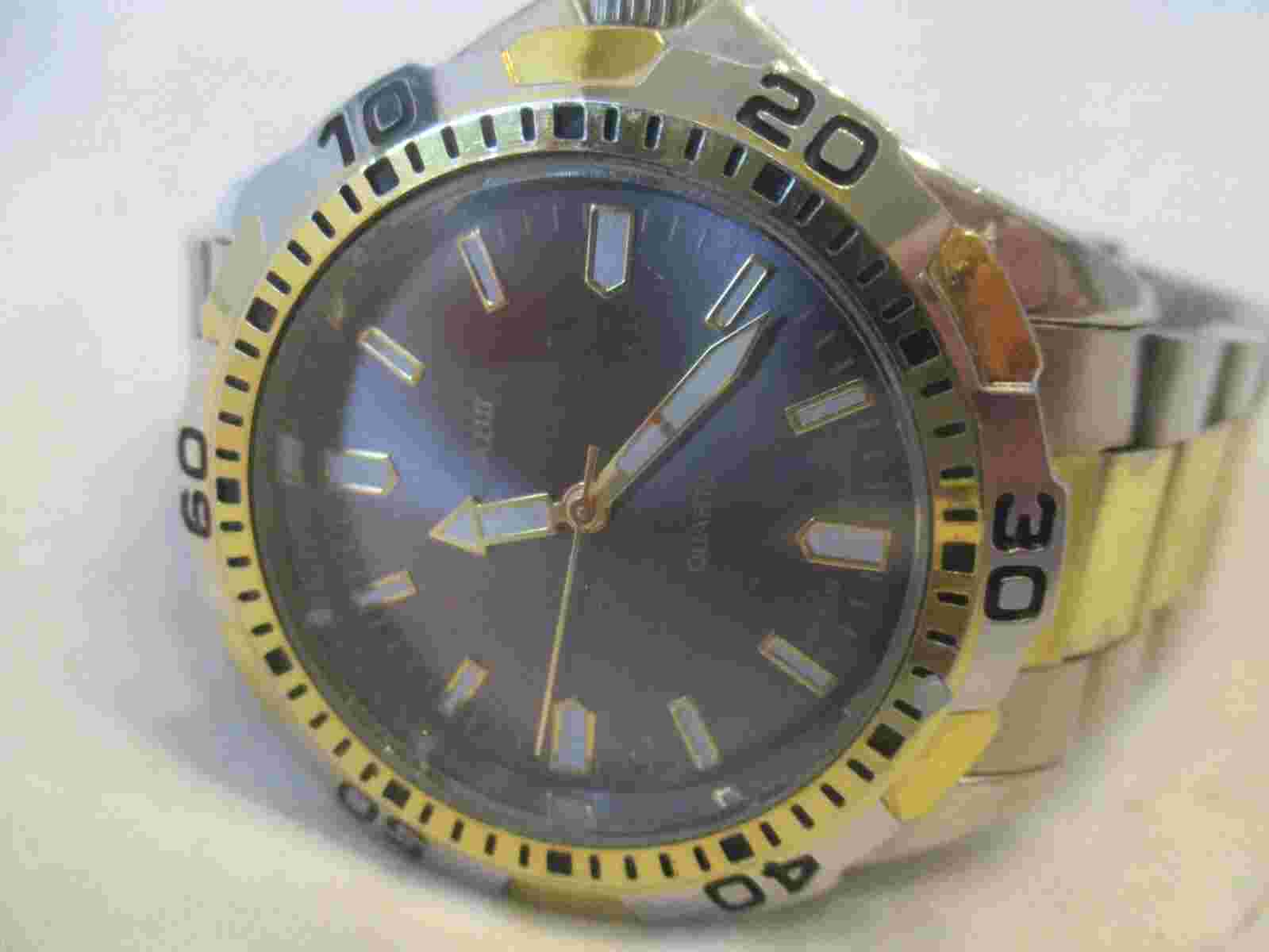 Cote d' Azur Wristwatch Gold & Silver Tone Stainless Steel Band Round Face