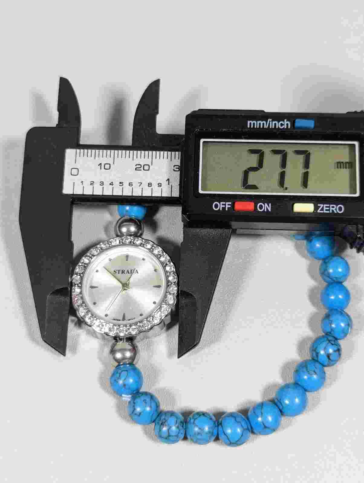 Strada Silver Tone Dial Crystal Accent Round Case Blue Bead Band Watch