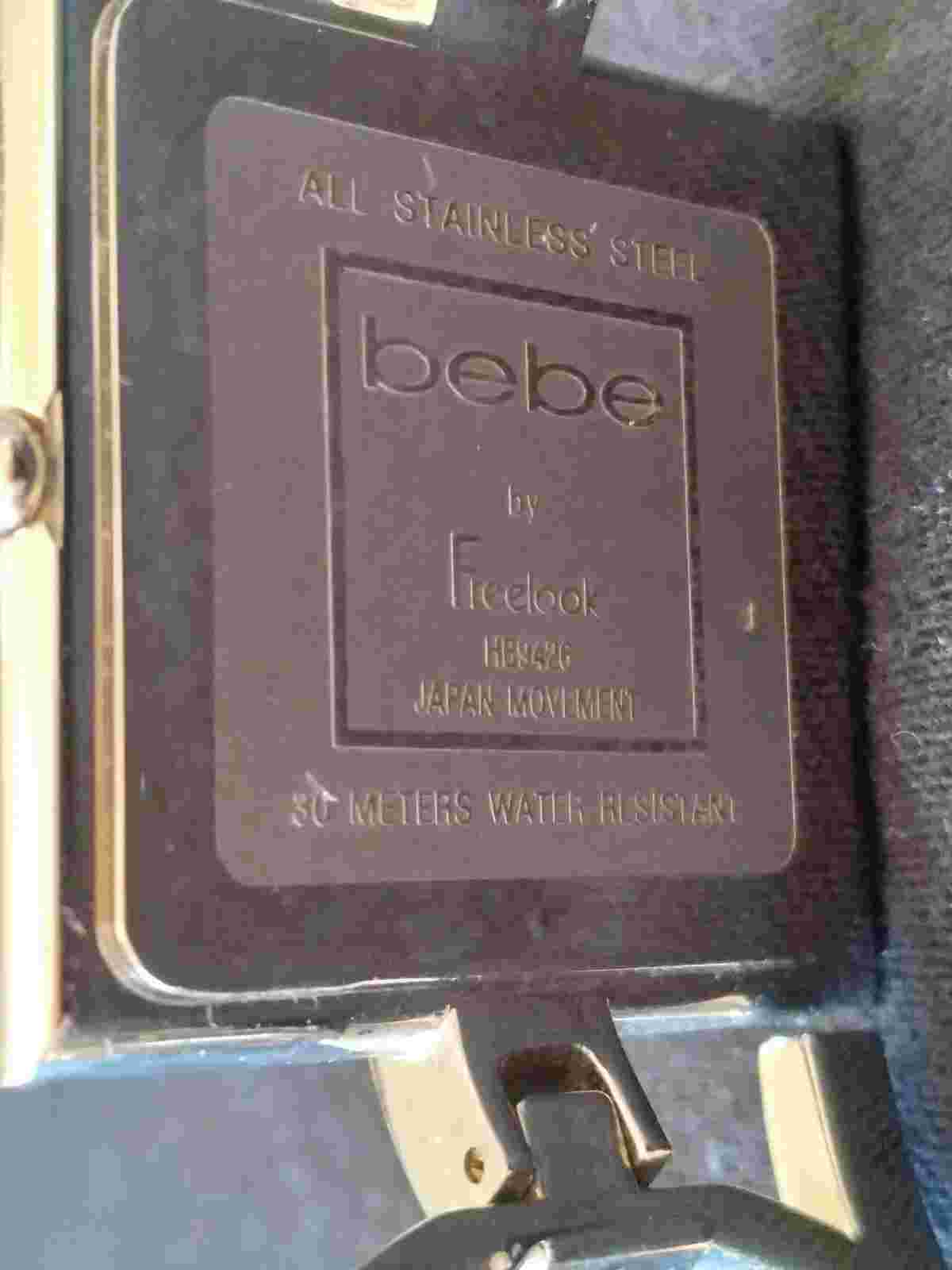 Bebe by Freelook women's Square Rhinestone watch Bebe spelled out on band. Works