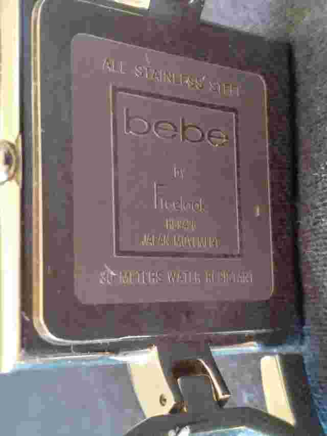 Bebe by Freelook women's Square Rhinestone watch Bebe spelled out on band. Works