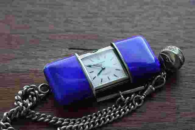 Movado
                           
                                 Ermeto Enamel and Silver pocket / travel watch with chain in great condition