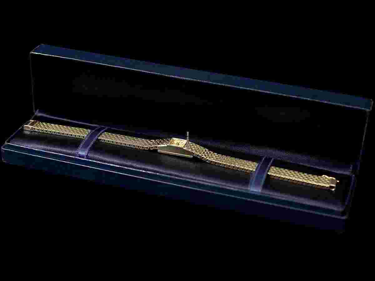 Tiffany
1960's Ladies Backwind Miniature Bracelet Watch - 14K Gold with Box