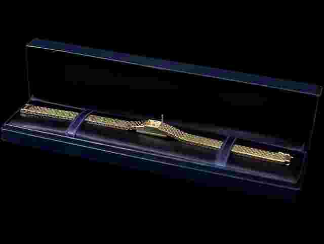 Tiffany
                           
                                 1960's Ladies Backwind Miniature Bracelet Watch - 14K Gold with Box