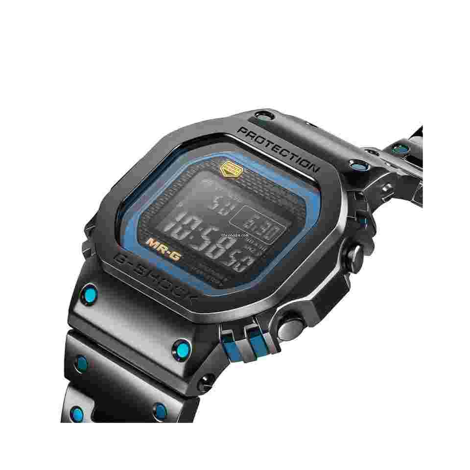Casio G-Shock
                           
                                 Blue Ink Ref. MRG-B5000BA-1DR Black Dial Black Steel Bracelet