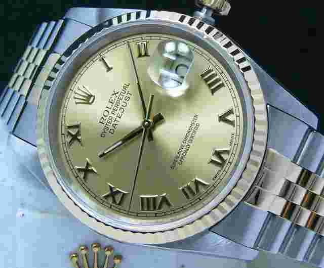 Rolex Datejust 36
                           
                                 1994 Datejust 36 Boxes Papers Champagne Roman Numeral Dial Fluted Bezel 16233