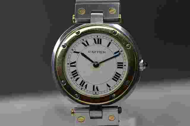Cartier Santos
                           
                                 Ronde Stahl Gold 18 kt Quartz mit Papiere