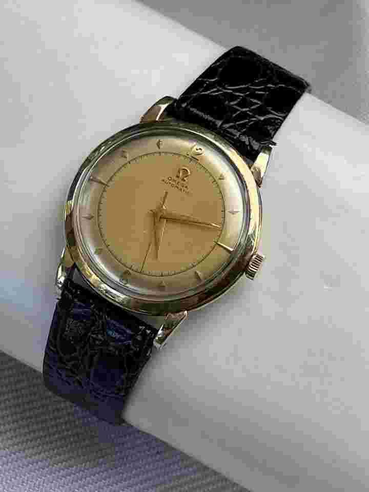 Omega Bumper
Gold Capped Bumper Automatic Two Tone Pie Pan Dial Screw Down Back Vintage G6232 Swiss