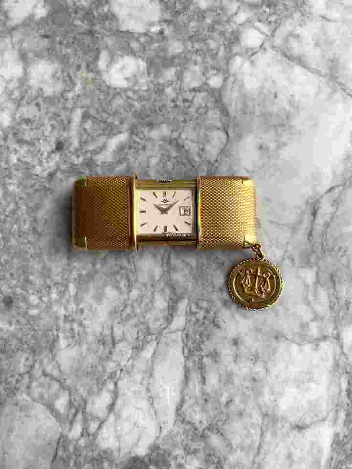 Movado
                           
                                 Vintage 1950s 18K Gold Manual Wind Travel Clock.