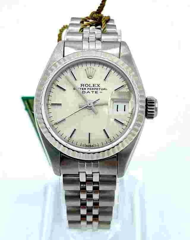 Rolex Oyster Perpetual Lady Date
                           
                                 6917 Linen Dial Stainless Steel Jubilee Band Watch